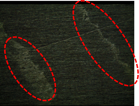 图1：模垢与小分子沉积制件表面的显微照片
